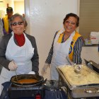 Happy volunteers served hundreds of meals Thursday.